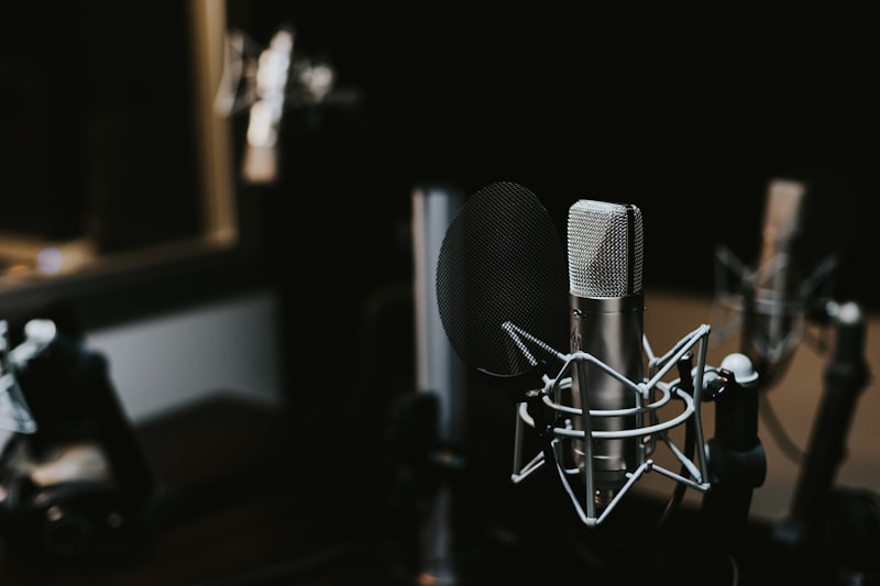 Close up view of professional audio mixer dials in a dark studio room
